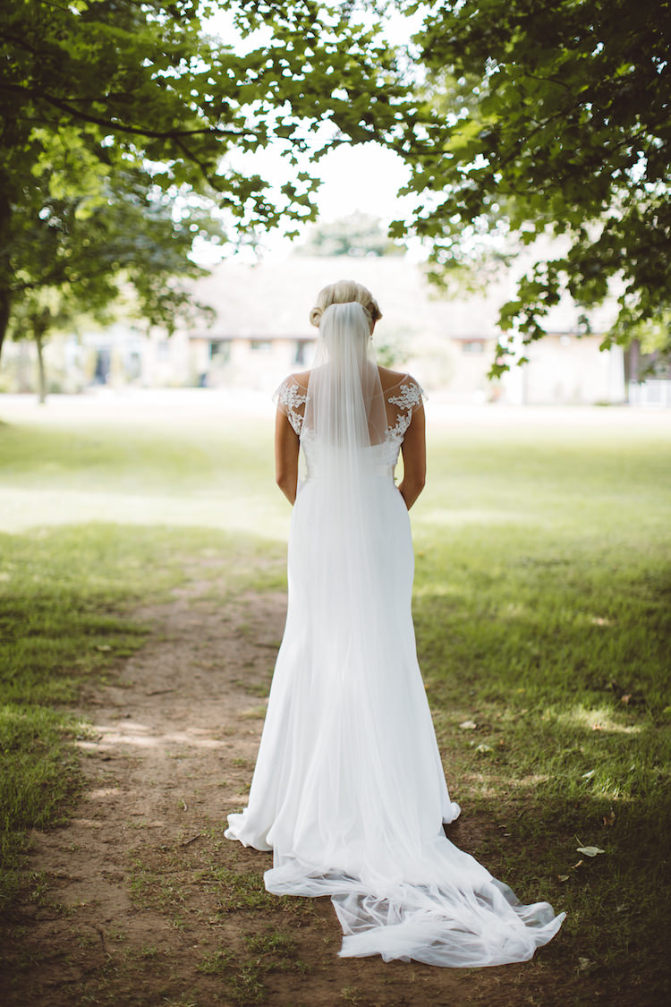 Mayfair by Suzanne Neville Dress Gown Bride Bridal Sleeves Veil Fishtail IllusionCotswolds Country House Marquee Wedding http://www.wearegatheredheretoday.com/
