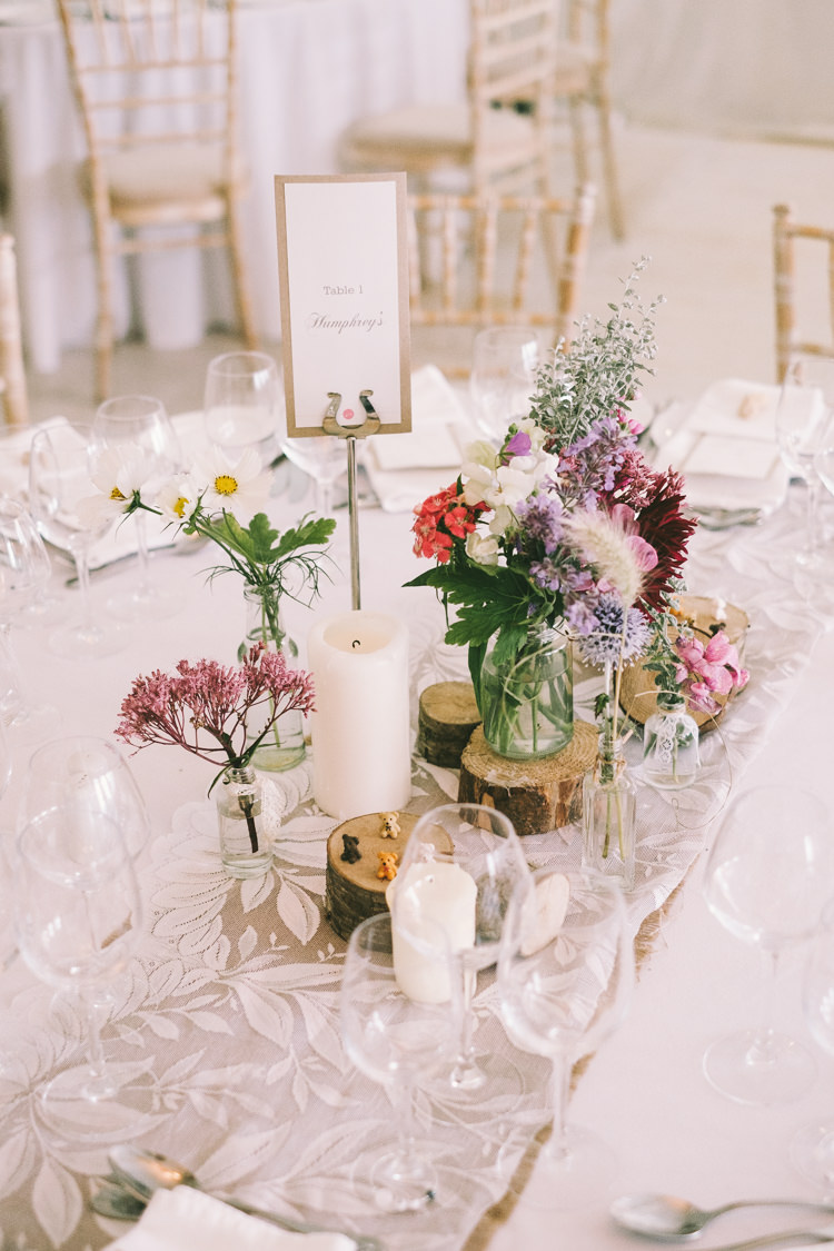 Table Centrepiece Flowers Jars Log Slices Lace Candles Pretty Light Pink Country House Wedding http://jonathanryderphotography.com/