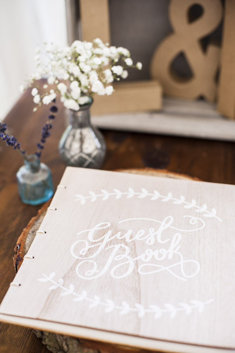 Wooden Guest Book Whimsical Summery Lilac Wedding http://eleanorjaneweddings.co.uk/