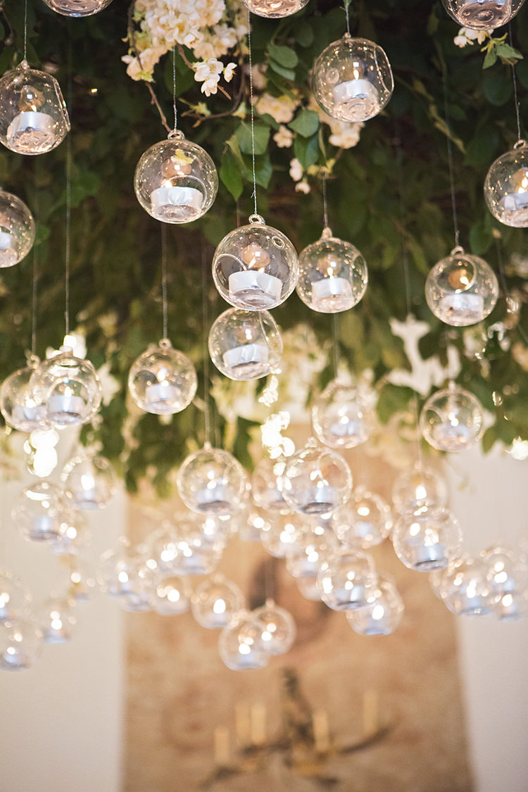 Hanging Tealights Floral Installation Elegant Luxe Red Blue Winter Wedding http://www.bennicarolweddingphotography.com/