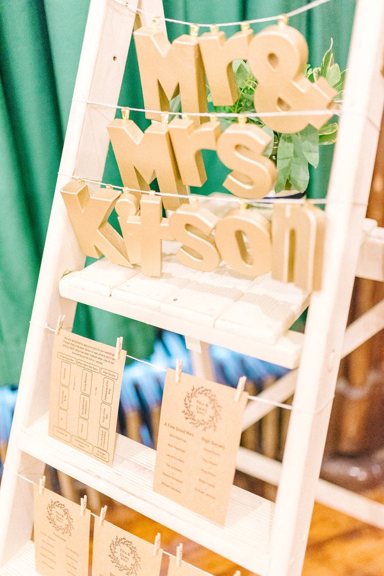 Wooden Ladder Seating Plan Table Chart Playful Stylish Navy Winter Wedding http://sarahjaneethan.co.uk/