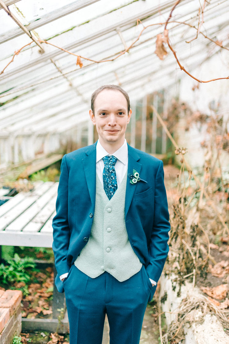 Blue Suit Grey Waistcoat Floral Tie Groom Playful Stylish Navy Winter Wedding http://sarahjaneethan.co.uk/