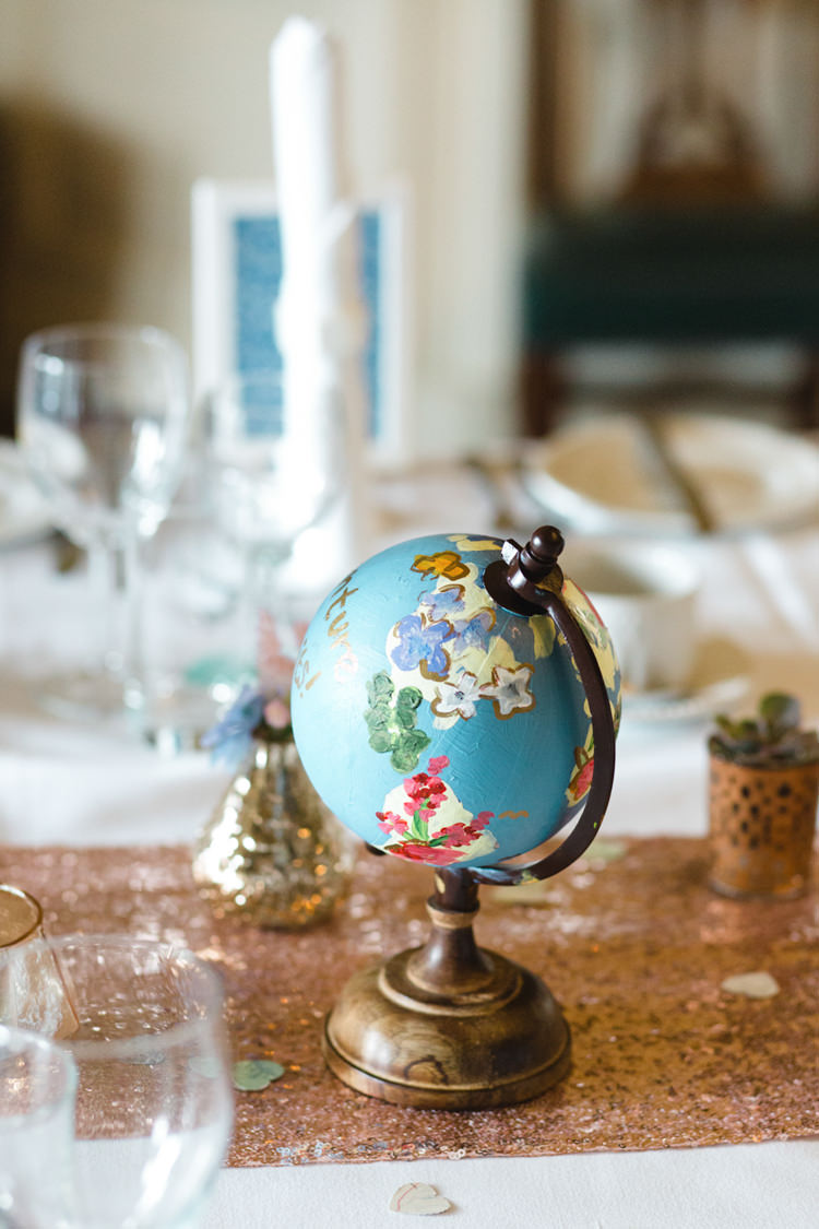Painted Globe Decor Whimsical Pastel Travel Wedding https://www.thegibsonsphotography.co.uk/