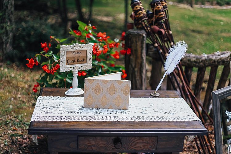 Outdoor Ceremony Guestbook Wooden Table Lace Runner Feather Pen Framed Sign Bohemian & Whimsical Garden Wedding in North Carolina http://www.taylorparkerphotography.com/
