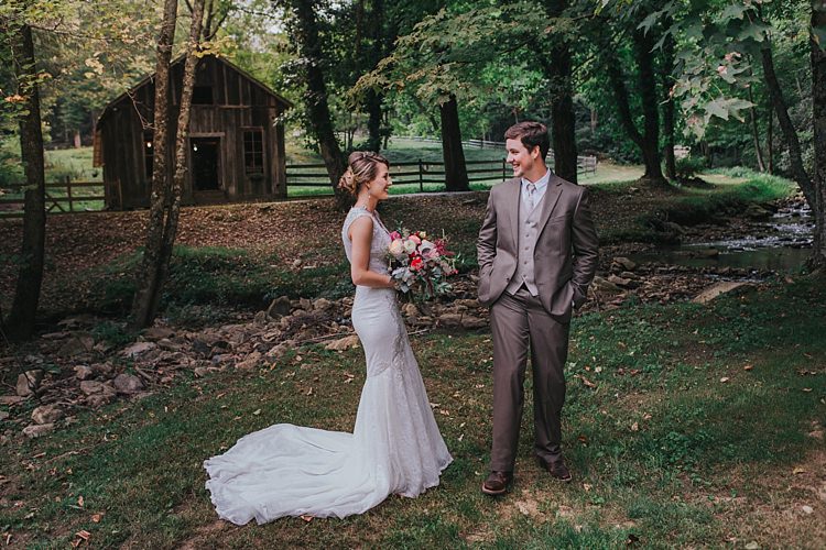 Outdoor First Look Bride V Neck Lace Embellished Bridal Gown Multicoloured Bouquet Groom Grey Suit White Shirt Light Grey Tie Vest Bohemian & Whimsical Garden Wedding in North Carolina http://www.taylorparkerphotography.com/