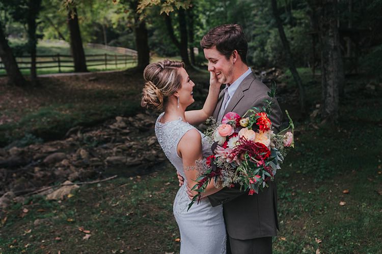 Outdoor First Look Bride V Neck Lace Embellished Bridal Gown Multicoloured Bouquet Groom Grey Suit White Shirt Light Grey Tie Vest Bohemian & Whimsical Garden Wedding in North Carolina http://www.taylorparkerphotography.com/