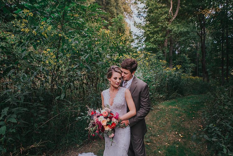 Outdoor First Look Bride V Neck Lace Embellished Bridal Gown Multicoloured Bouquet Groom Grey Suit White Shirt Light Grey Tie Vest Bohemian & Whimsical Garden Wedding in North Carolina http://www.taylorparkerphotography.com/