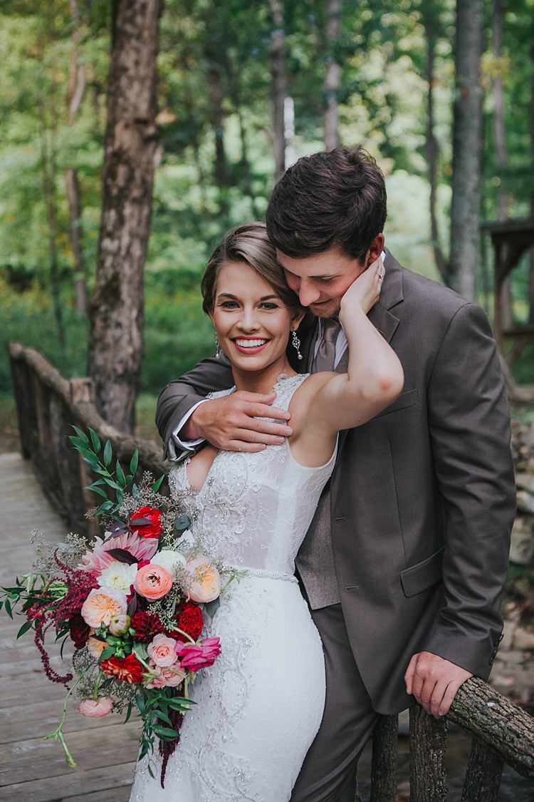 Outdoor First Look Bride V Neck Lace Embellished Bridal Gown Multicoloured Bouquet Groom Grey Suit White Shirt Light Grey Tie Bohemian & Whimsical Garden Wedding in North Carolina http://www.taylorparkerphotography.com/