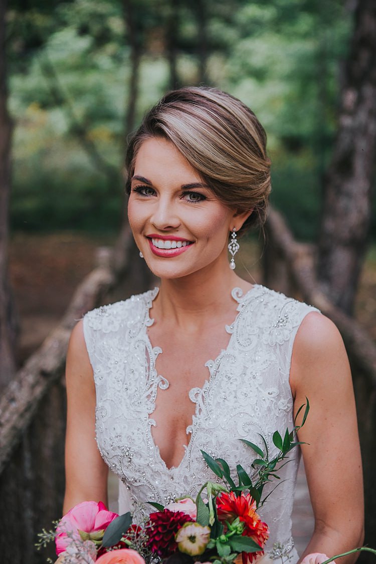 Bride V Neck Lace Embellished Bridal Gown Drop Crystal Pearl Earrings Multicoloured Bouquet Bohemian & Whimsical Garden Wedding in North Carolina http://www.taylorparkerphotography.com/