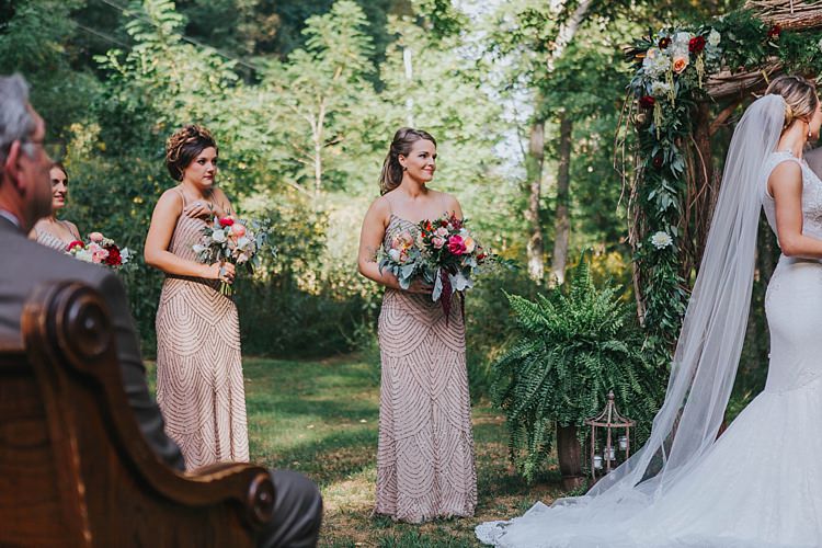 Outdoor Ceremony Bride Lace Embellished Gown Long Veil Bridesmaids Champagne Sequin Dresses Multicoloured Bouquets Floral Arch Bohemian & Whimsical Garden Wedding in North Carolina http://www.taylorparkerphotography.com/