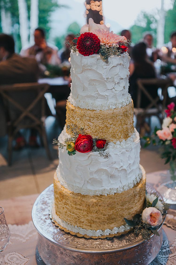 Reception Wedding Cake Four Tiers Textured Buttercream Gold Sequin Icing Multicoloured Florals Metallic Cake Stand Bohemian & Whimsical Garden Wedding in North Carolina http://www.taylorparkerphotography.com/