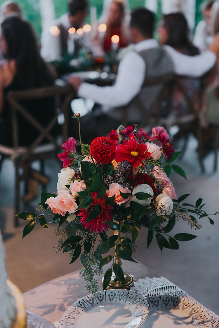 Reception Table Setting Bright Multicoloured Florals Gold Vase Patterned China Lace Table Runner Guests Candles Bohemian & Whimsical Garden Wedding in North Carolina http://www.taylorparkerphotography.com/
