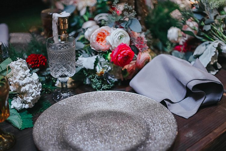 Reception Table Setting Bright Multicoloured Florals Greenery Gold Candlesticks Metallic Plates White Goblets Bohemian & Whimsical Garden Wedding in North Carolina http://www.taylorparkerphotography.com/