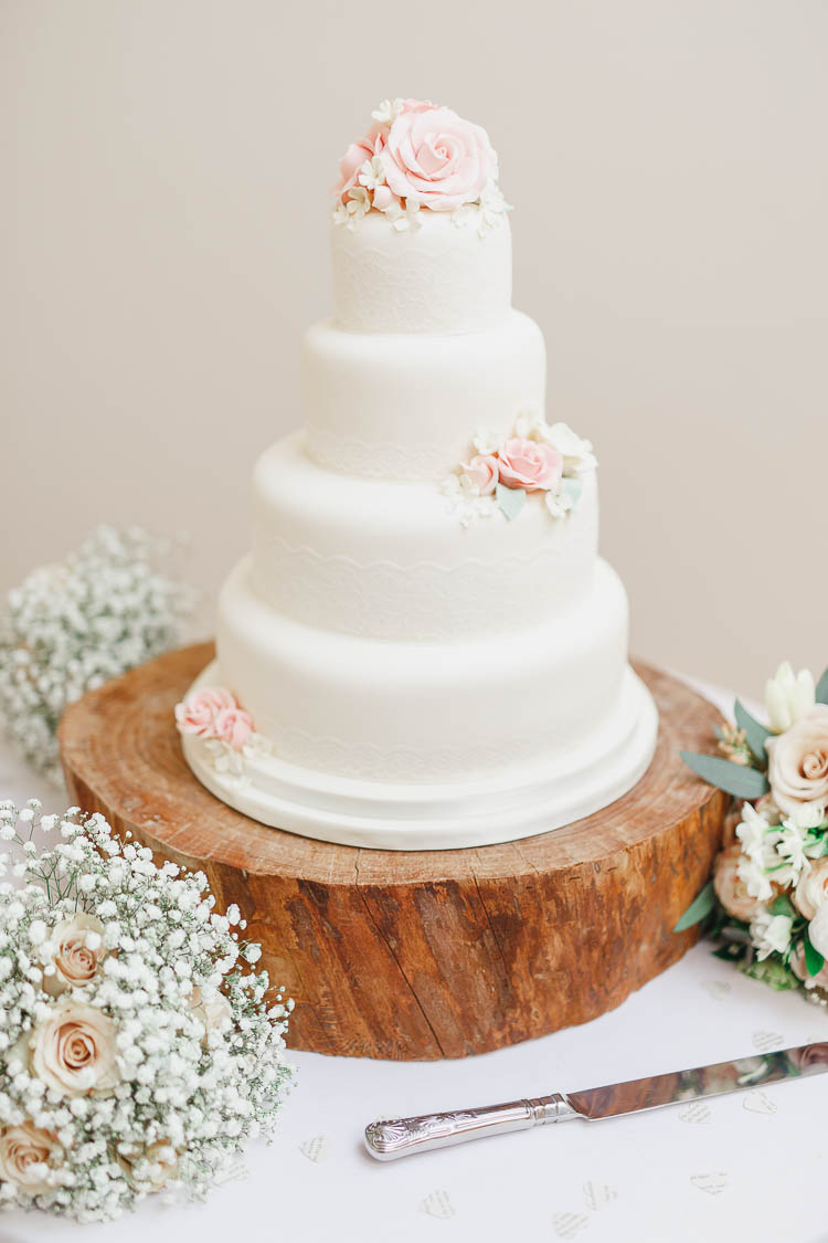 Ivory Lace Cake Flowers LogBeautiful Rustic Fairy Lights Barn Wedding http://whitestagweddings.com/
