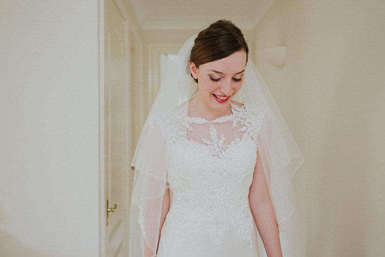Lace Dress Gown Veil Justin Alexander Stylish Hand Made Rainy Summer Barn Wedding http://www.kategrayphotography.com/