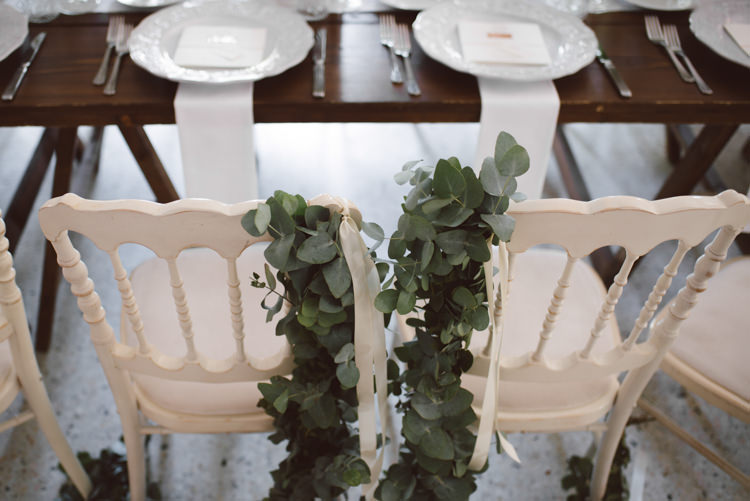 Reception Long Wooden Table White Table Runner White Chairs Greenery White Ribbons Patterned White China Botanical Copper Greenery Lake Como Wedding http://margheritacalatiphotography.com/