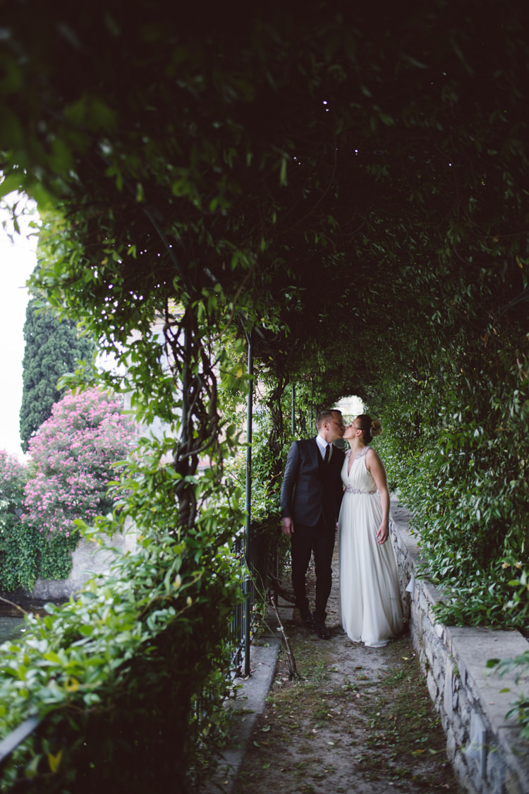 Bride V Neck Jenny Packham Embellished Bridal Gown Groom Tailored Black Suit White Shirt Black Tie Botanical Copper Greenery Lake Como Wedding http://margheritacalatiphotography.com/