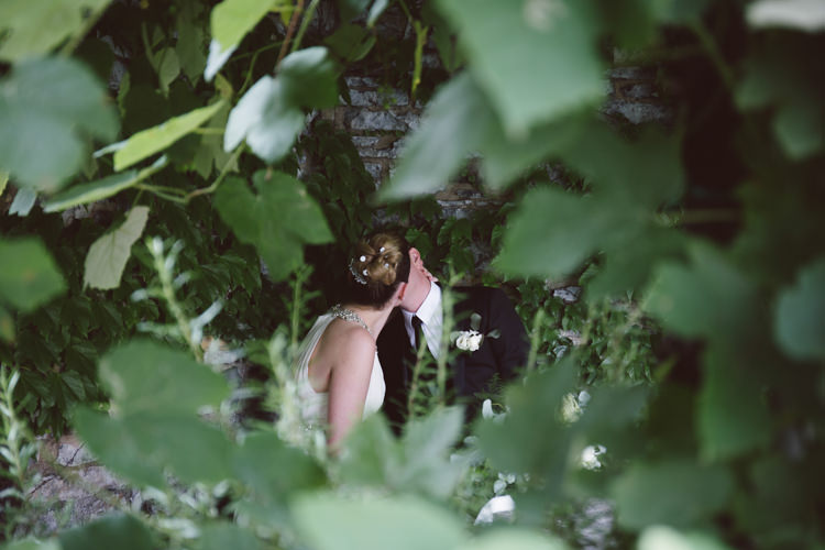Bride V Neck Jenny Packham Embellished Bridal Gown Groom Tailored Black Suit White Shirt Black Tie Floral Buttonhole Botanical Copper Greenery Lake Como Wedding http://margheritacalatiphotography.com/