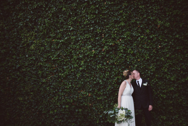 Bride V Neck Jenny Packham Embellished Bridal Gown Bouquet White Florals Greenery Groom Tailored Black Suit White Shirt Black Tie Floral Buttonhole Botanical Copper Greenery Lake Como Wedding http://margheritacalatiphotography.com/