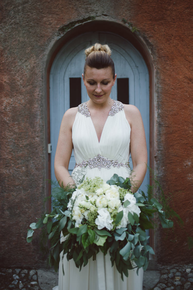Bride V Neck Jenny Packham Embellished Bridal Gown Bouquet White Florals Roses Greenery Eucalyptus Botanical Copper Greenery Lake Como Wedding http://margheritacalatiphotography.com/