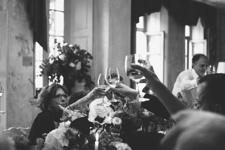 Reception Guests White Florals Greenery Wine Glasses Cheers Botanical Copper Greenery Lake Como Wedding http://margheritacalatiphotography.com/