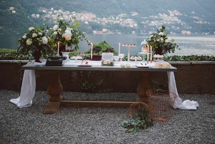 Reception Dessert Table Copper Candlesticks White Florals Greenery Copper Baskets Lake View Botanical Copper Greenery Lake Como Wedding http://margheritacalatiphotography.com/