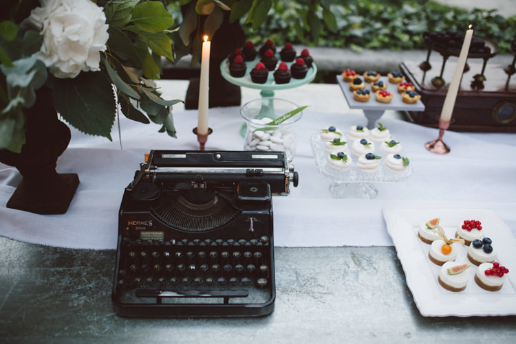 Reception Dessert Table Vintage Typewriter White Florals Greenery Copper Candlesticks Botanical Copper Greenery Lake Como Wedding http://margheritacalatiphotography.com/