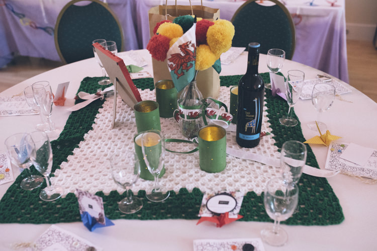 Decor Centrepiece Crochet Cloth Tin Cans Pom Poms Alternative Creative Budget Wedding http://www.petecranston.com/