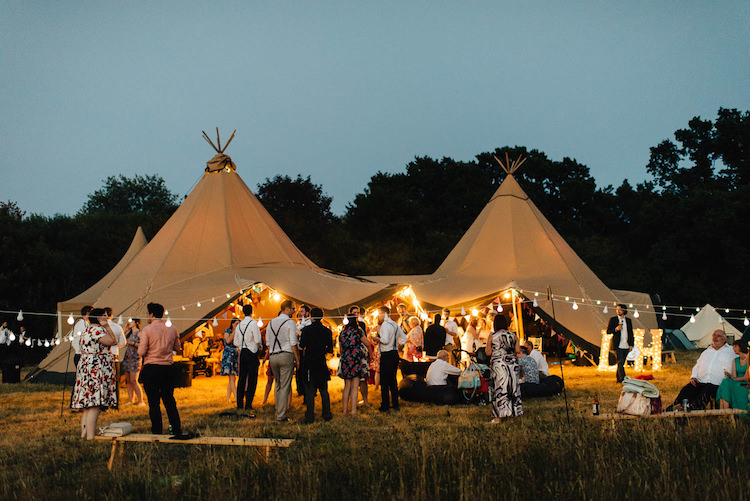 Tipi Festoon Lights Informal Camp Woodland Wedding https://stevenanthonyphotography.co.uk/
