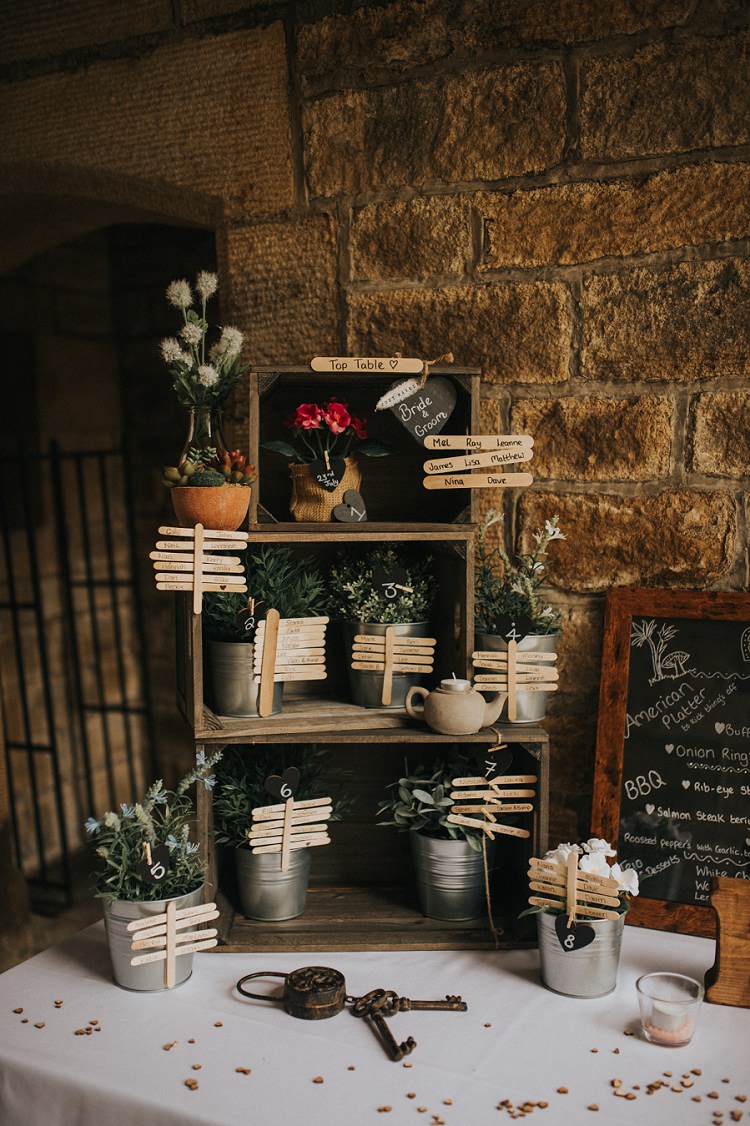 Seating Plan Table Chart Crates Sticks Potted Plants Enchanting Woodland Boho Wedding http://www.kerrydiamondphotography.com/