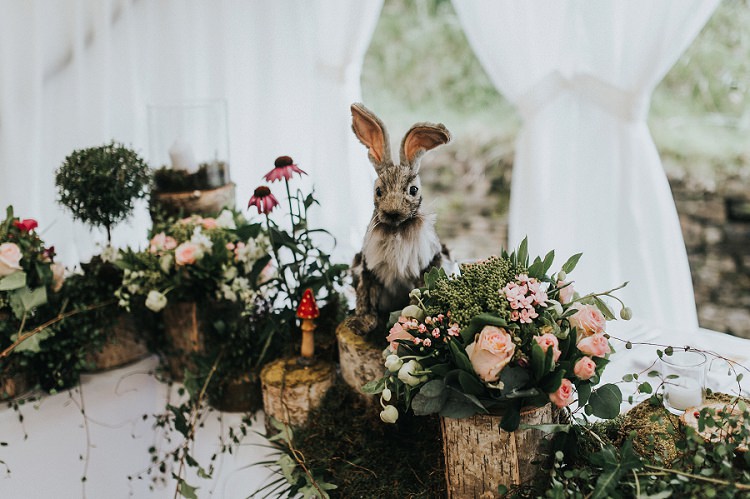 Logs Flowers Animals Hare Roses Foliage Greenery Decor Toadstools Enchanting Woodland Boho Wedding http://www.kerrydiamondphotography.com/