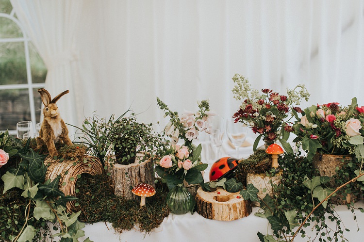 Logs Flowers Animals Hare Roses Foliage Greenery Decor Toadstools Enchanting Woodland Boho Wedding http://www.kerrydiamondphotography.com/