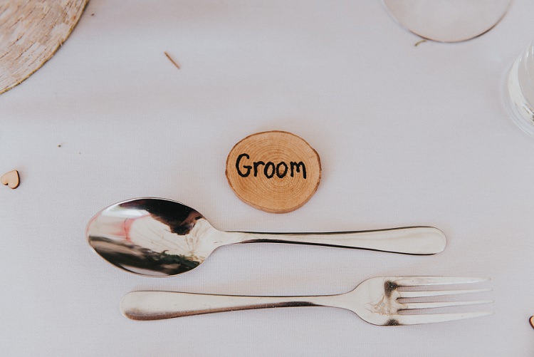 Log Slice Place Name Setting Enchanting Woodland Boho Wedding http://www.kerrydiamondphotography.com/