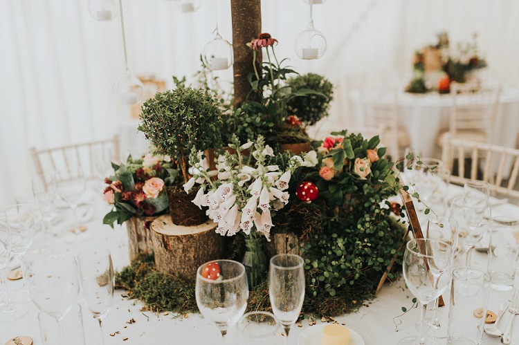 Logs Flowers Animals Hare Roses Foliage Greenery Decor Toadstools Enchanting Woodland Boho Wedding http://www.kerrydiamondphotography.com/