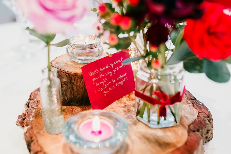 Table Centre Wood Slice Rose Jars Ribon Red Pink Candles Lyrics Fun Colourful Modern Music Wedding http://hollycollingsphotography.com/