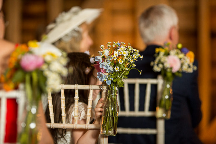 Milk Bottle Flowers Aisle Chair Pew End Ceremony Fun Multicolour Creative Barn Wedding http://www.mattparryphotography.co.uk/