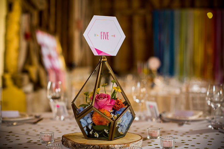 Terranuim Flower Centrepiece Number Table Log Fun Multicolour Creative Barn Wedding http://www.mattparryphotography.co.uk/