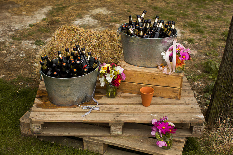 Booze Barrel Crate Flowers Fun Multicolour Creative Barn Wedding http://www.mattparryphotography.co.uk/