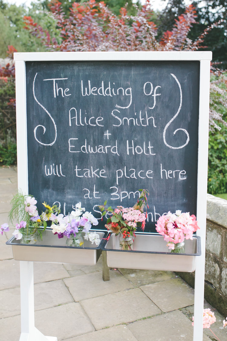 Black Chalk Sign Board Easel Delightfully Natural Pretty Garden Wedding http://www.elliegracephotography.co.uk/