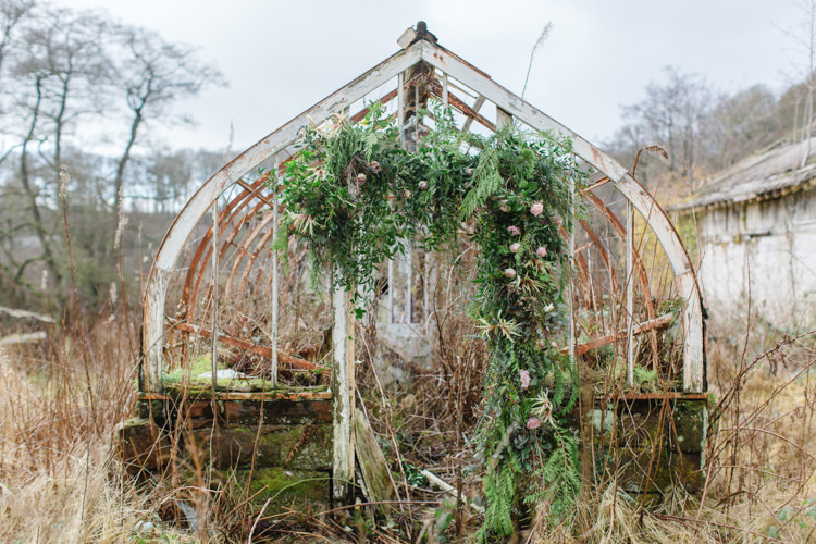 Flower Arch Backdrop Doorway Ceremony Greenery Foliage Botanical Beauty Abandoned Greenhouse Wedding Ideas https://www.thegibsonsphotography.co.uk/