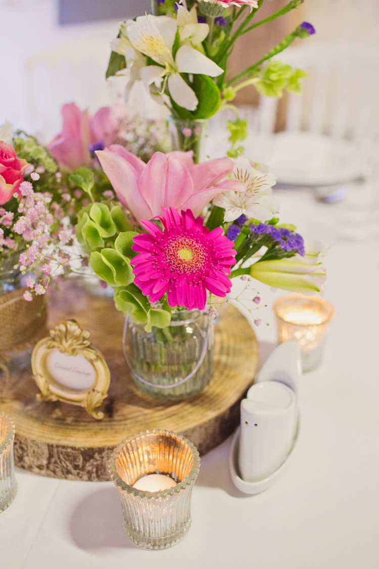 Table Centre Pink Purple Flower Jar Frame Candle Log Colour Pop Summer French Chateau Wedding http://www.cottoncandyweddings.co.uk/