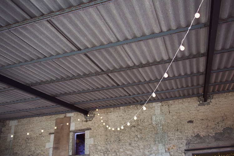 Barn Festoon Lighting Fairy Lights Colour Pop Summer French Chateau Wedding http://www.cottoncandyweddings.co.uk/