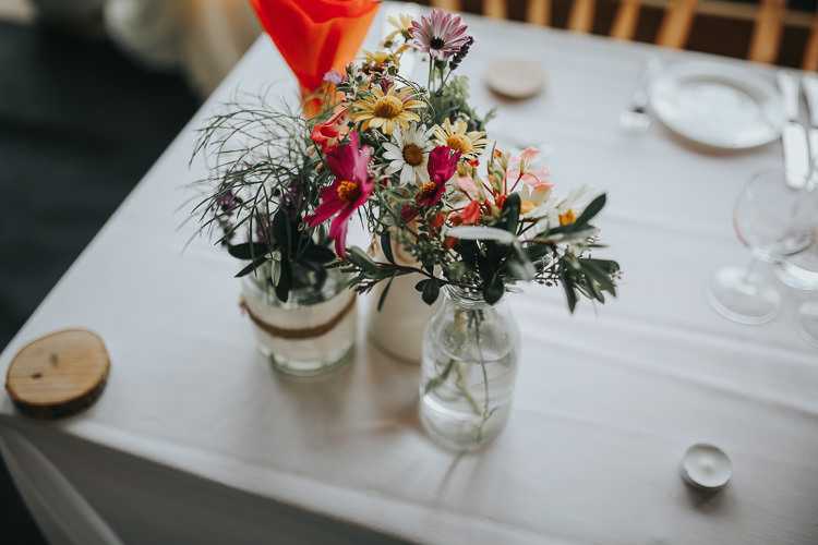 Jars Multicoloured Flowers Daisy Greenery Milk Bottles DIY Farm Weekend Long Wedding http://www.nestalloyd.co.uk/