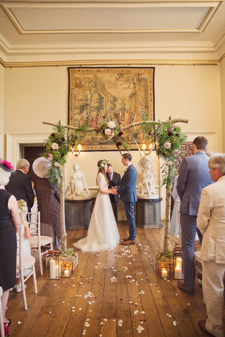 Red Burgundy Dahlia Blush Arch Branch Flowers Ceremony Backdrop Foliage Rose Antler Feather Stunning Countryside Wedding http://www.cottoncandyweddings.co.uk/
