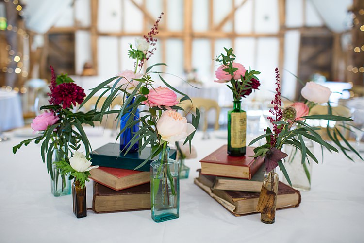 Vintage Books Bottle Flowers Centrepiece Decor Tables Fun Spring Floral Creative Wedding https://www.binkynixon.com/