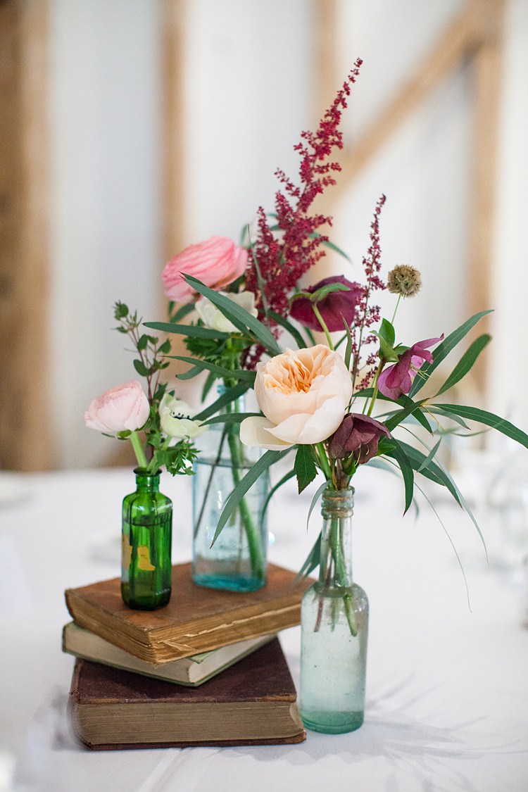Vintage Books Bottle Flowers Centrepiece Decor Tables Fun Spring Floral Creative Wedding https://www.binkynixon.com/