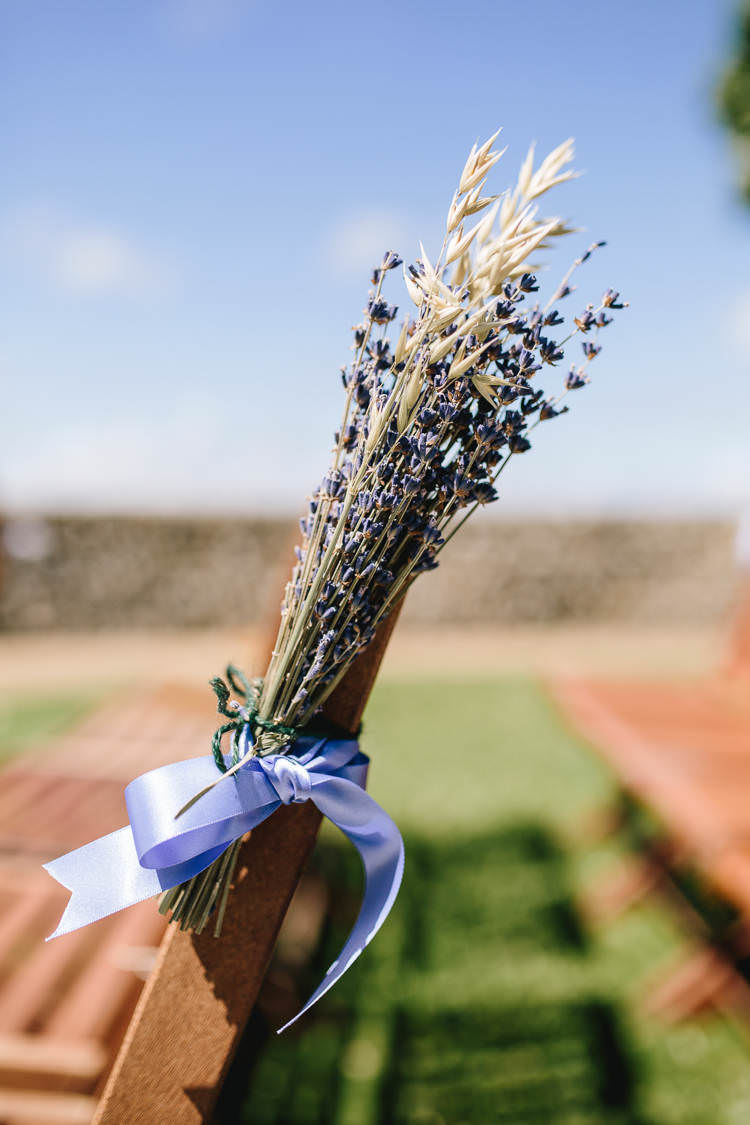 Aisle Decor Lavender Wheat Blue Ribbon Pretty Picturesque Outdoor Castle Wedding https://parkershots.com/