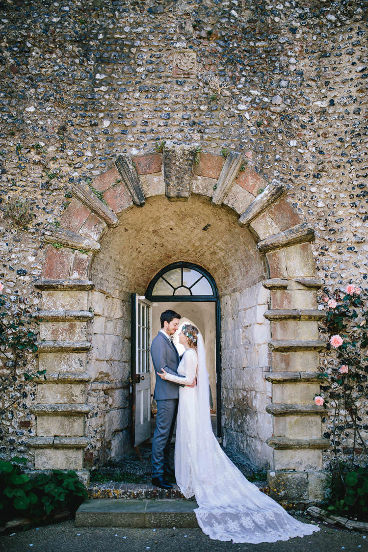 Long Sleeved Bride Bridal Dress Cathedral Length Veil Flower Crown Ted Baker Groom Pretty Picturesque Outdoor Castle Wedding https://parkershots.com/