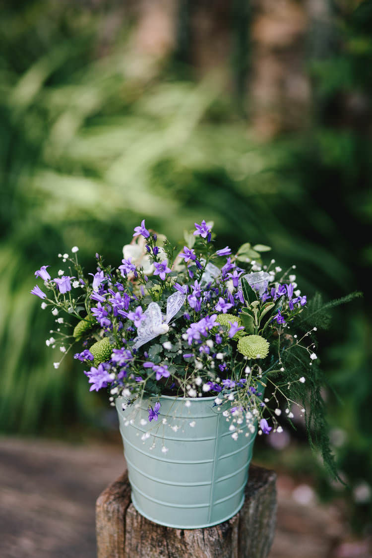 Tin Bucket Pot Purple Flowers Floral Gypsophila Decor Pretty Picturesque Outdoor Castle Wedding https://parkershots.com/