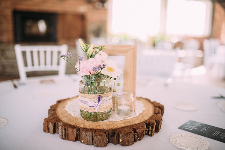 Centrepiece Decor Log Jar Flowers Candle Beautiful Lilac Garden Wedding New Zealand http://www.levienphotography.com/